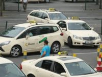 BERLIN, GERMANY - JUNE 11: Taxi drivers gather at Tegel Airport before many of them joined a protest through the city on June 11, 2014 in Berlin, Germany. Approximately 1,000 taxis had registered to participate in a protest that coincided with similar protests in cities across Europe against new apps like Wundercar and Uber that the taxi drivers claim are undermining their livelihood and creating unfair competition. (Photo by Sean Gallup/Getty Images)